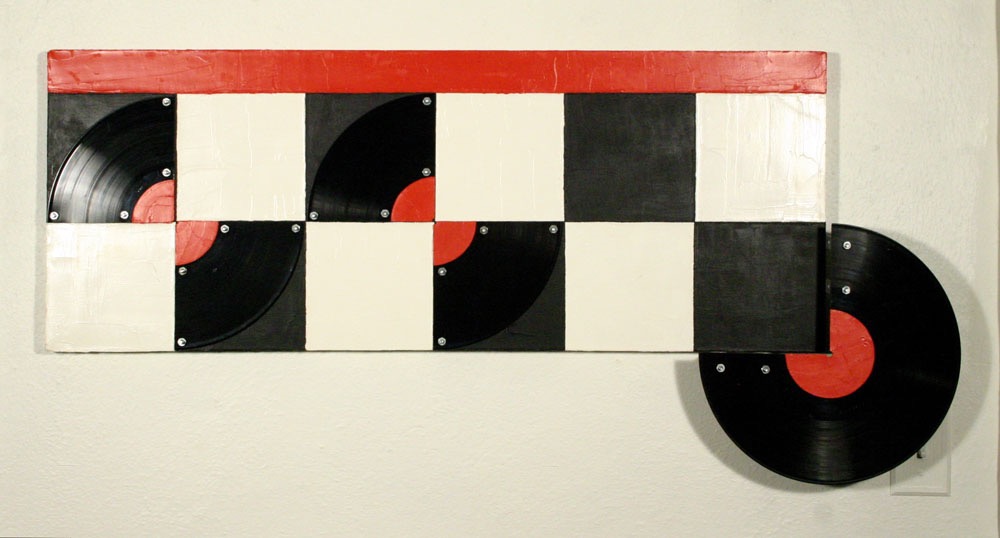Checkered Mute 1993 20x42x3 oil, vinyl records and hardware on canvas